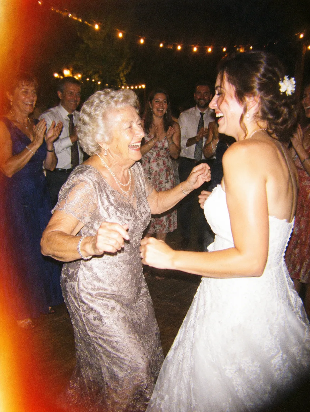 Grandma dancing with the bride